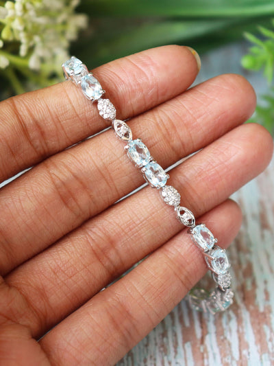 Oval Blue Topaz Tennis Bracelet, Sterling Silver, December Birthstone, Elegant Sky Blue Gemstone